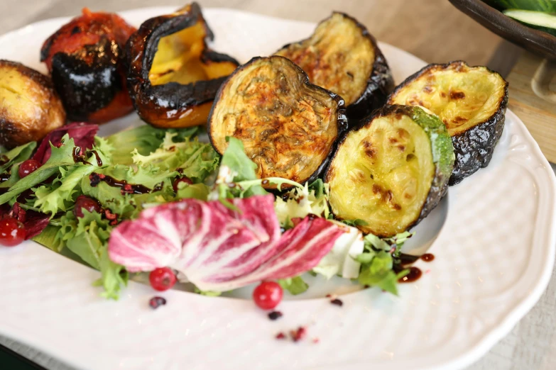 a white plate holding a variety of vegetables