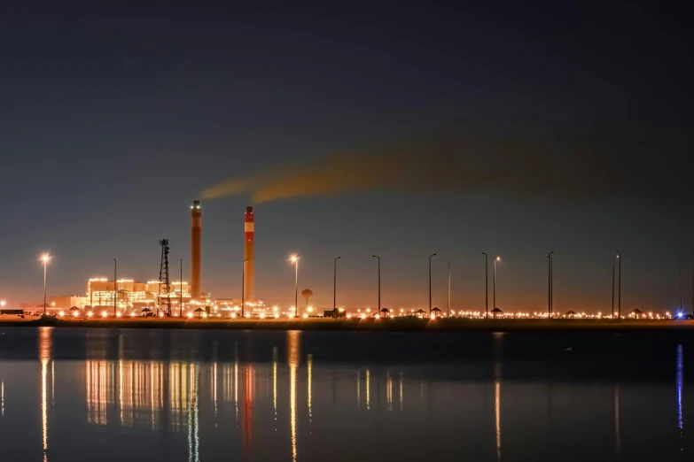 a po taken from the river looking at the refinery