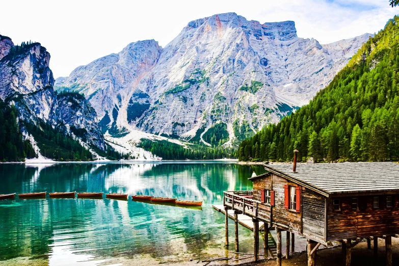 the boathouse is next to a very big lake