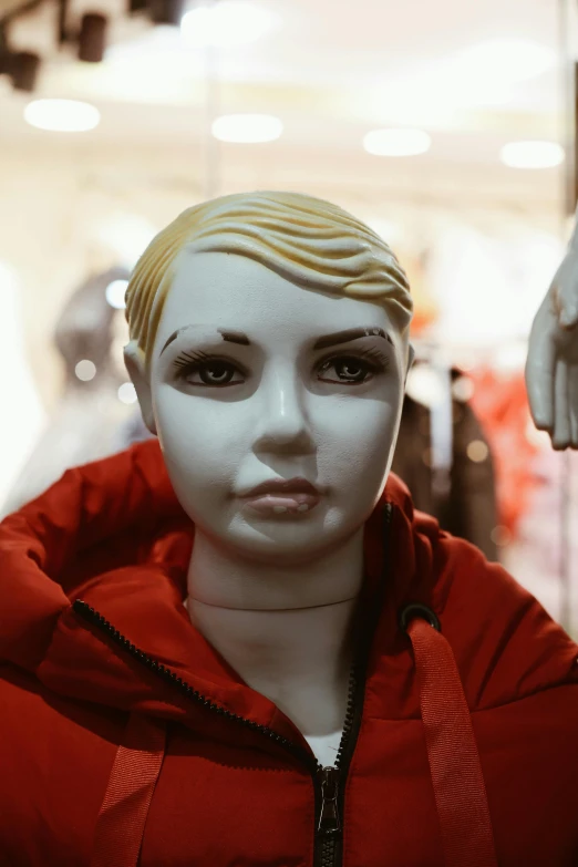 a close up view of a mannequin wearing a hoodie