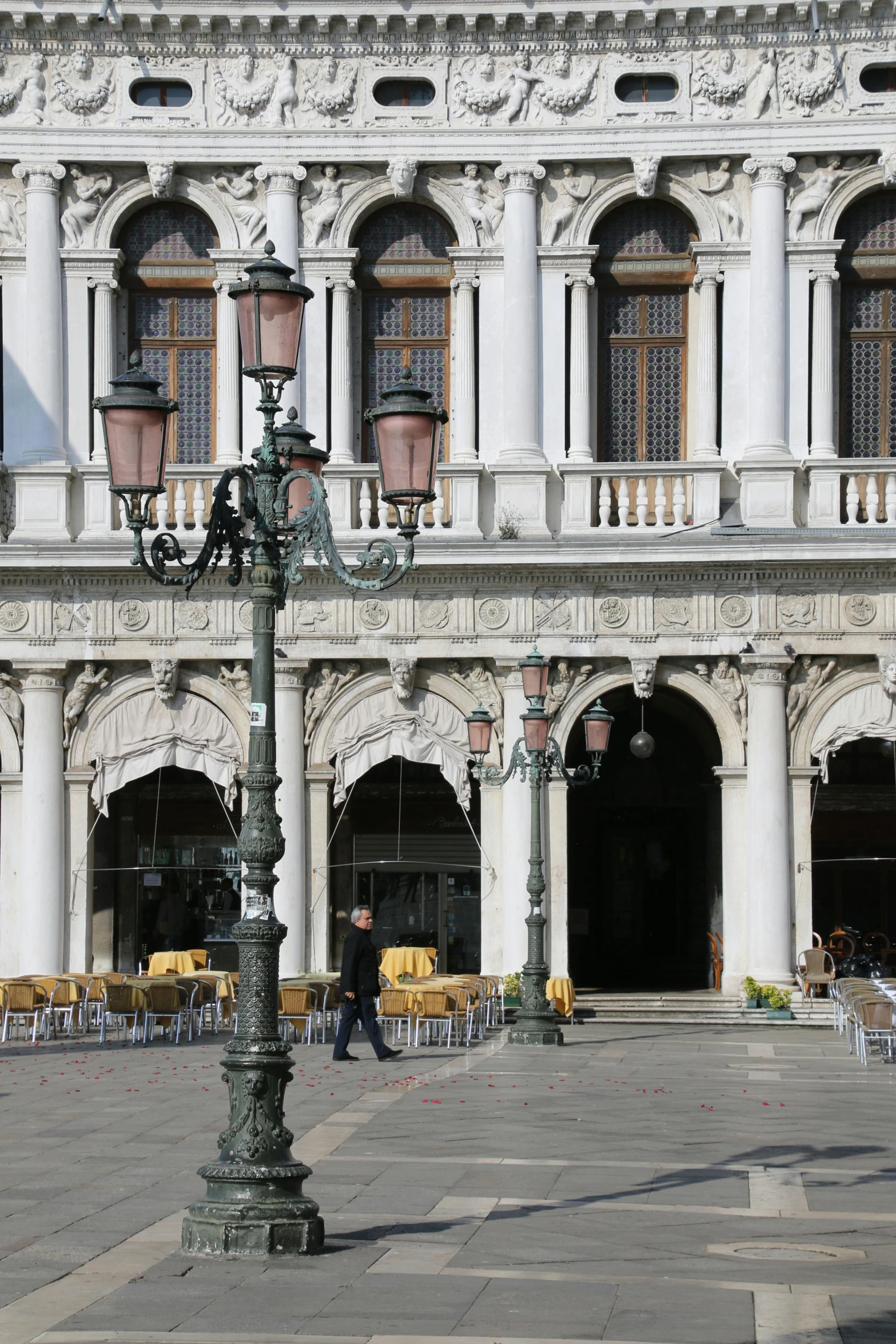 the view of a building from the corner of the street