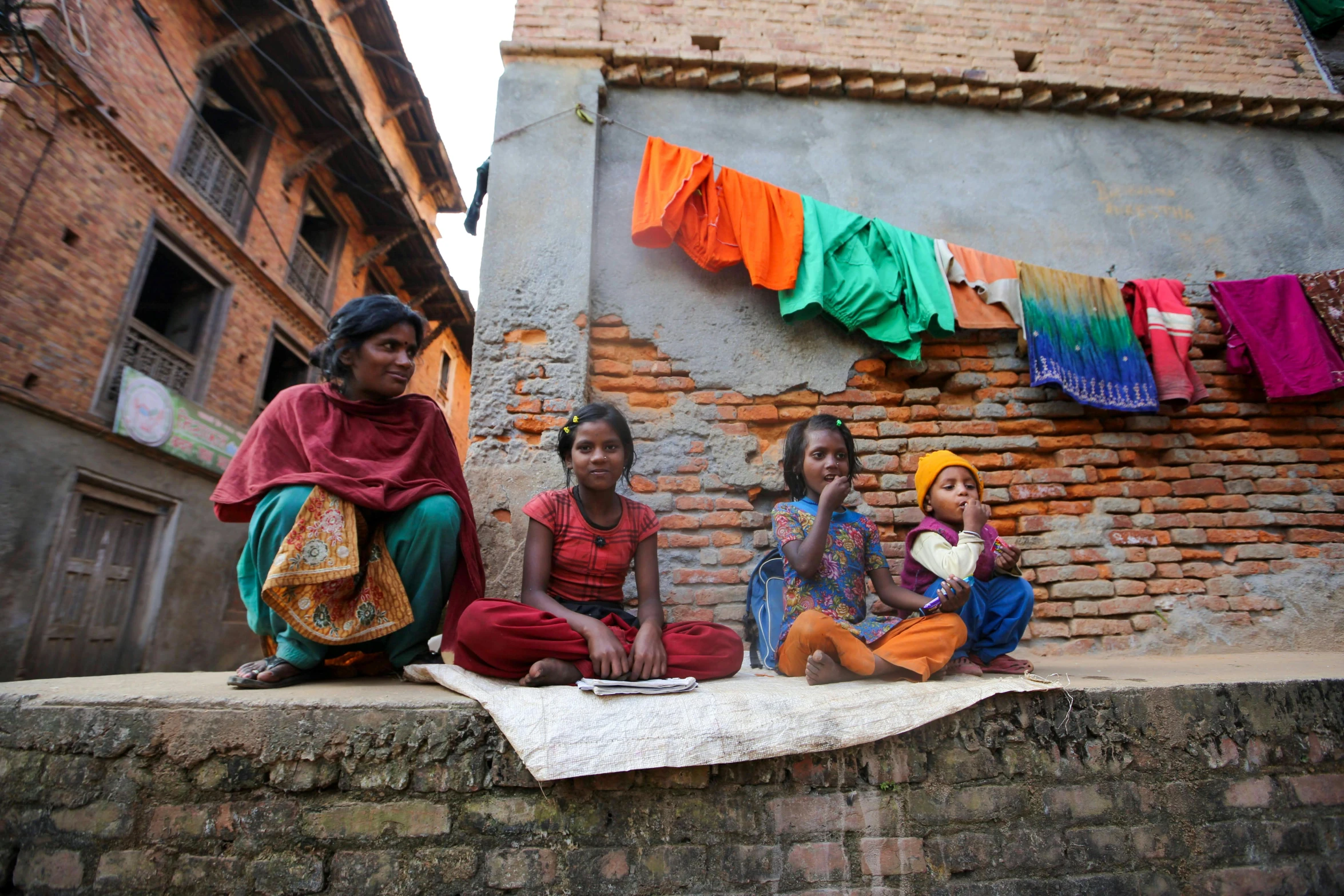 a group of people sitting next to each other