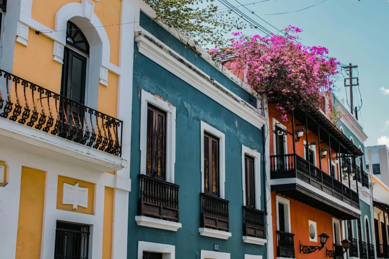 an image of some houses painted in colors of different shades