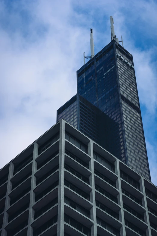 the building is under construction with a lot of windows