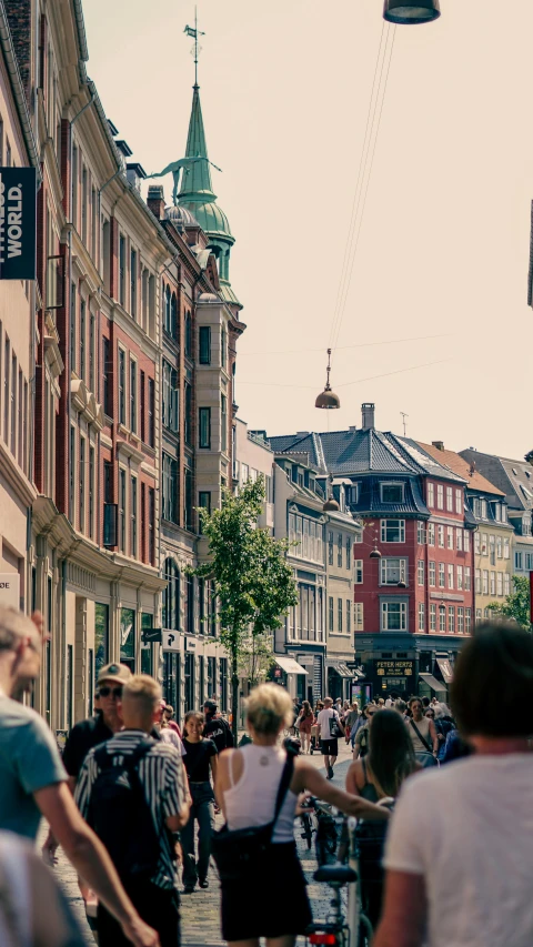 a group of people walking down a street