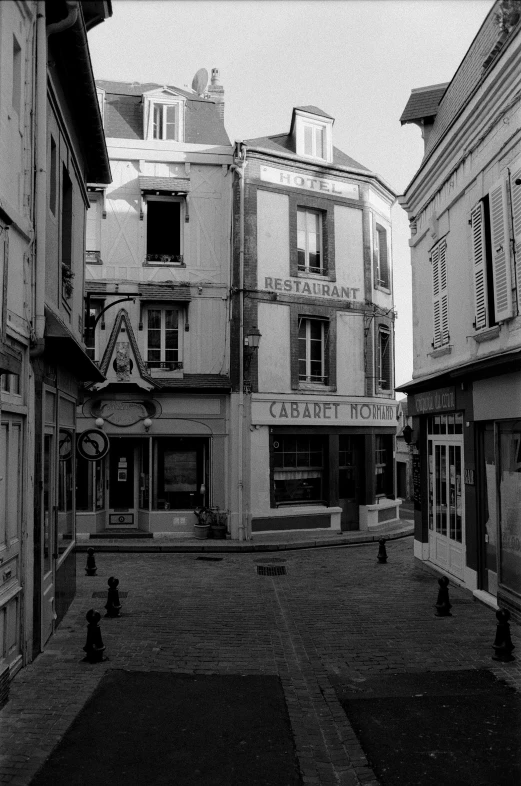 this is a black and white image of a building in a european square