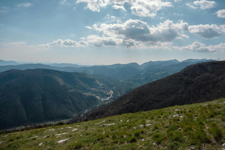 a view of the valley from the top of the hill