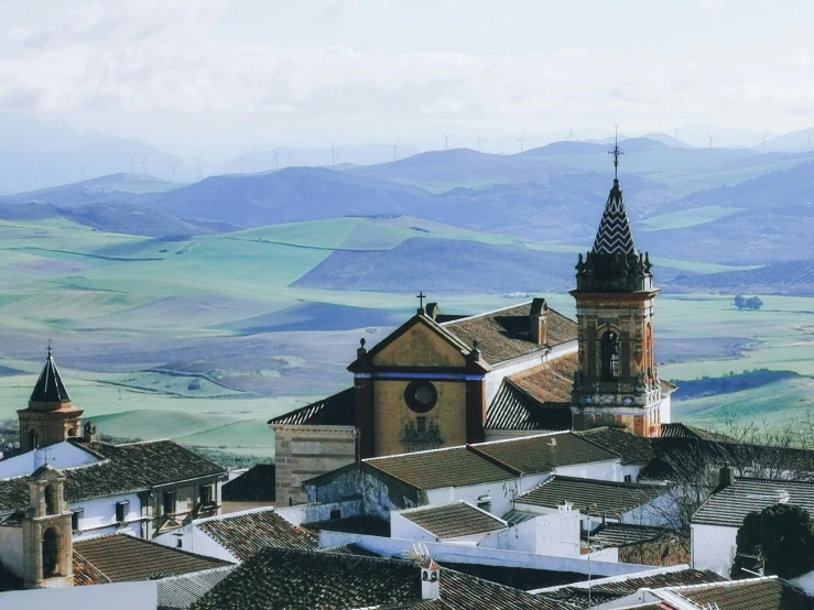 a very tall church on top of a hill