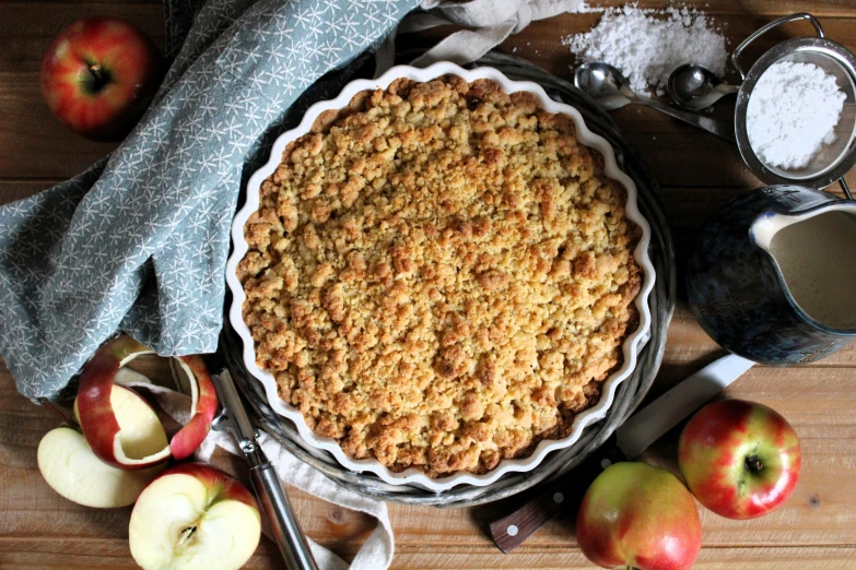 an apple pie is displayed in an image