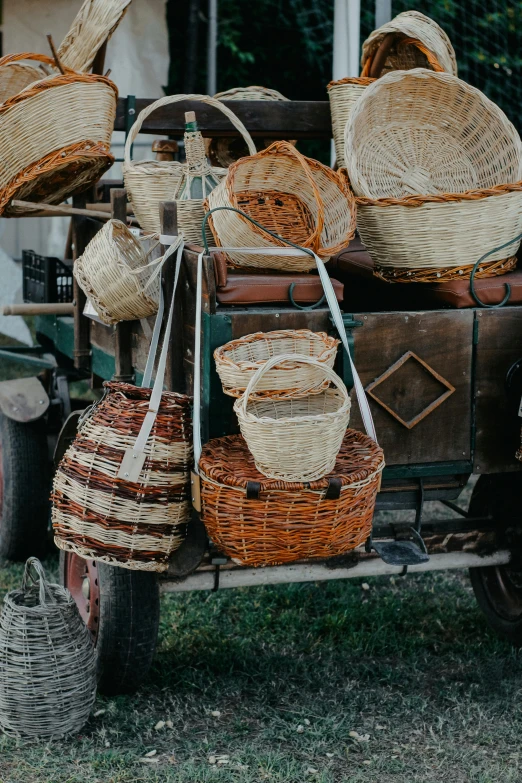 a motorcycle carrying many woven baskets in it