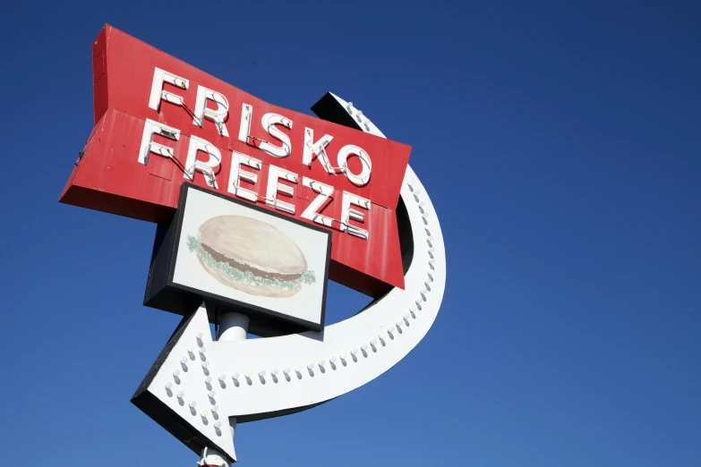 a friskko sign is up in the sky