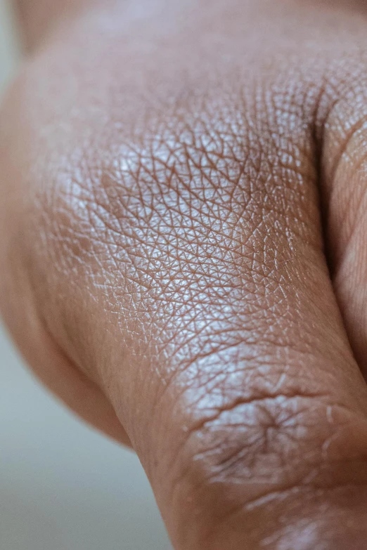 closeup of the skin on someones toe