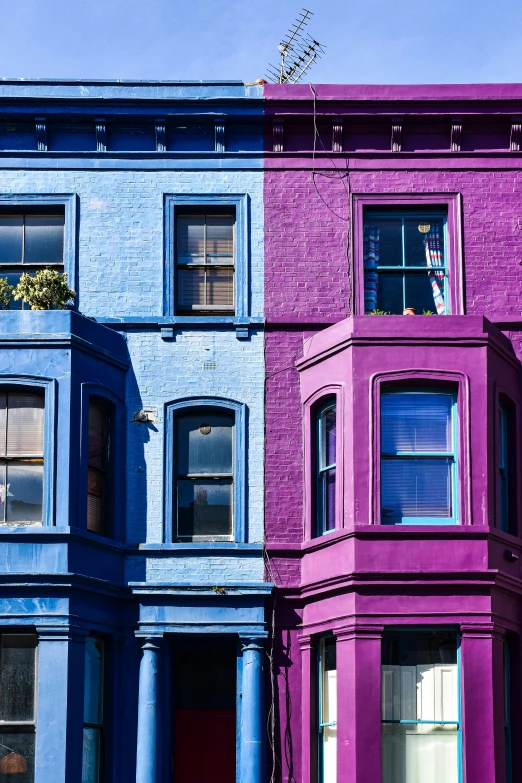 two colorful buildings next to each other and with no one on it