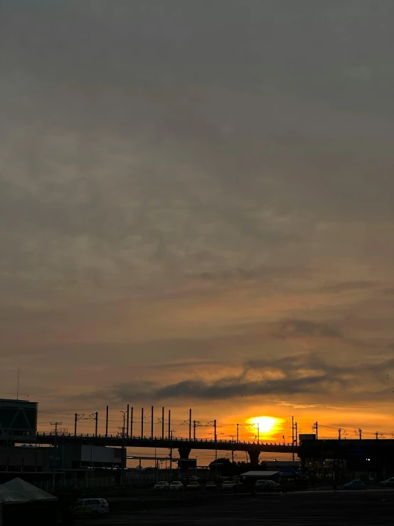 a plane is flying through the air with sun in the background