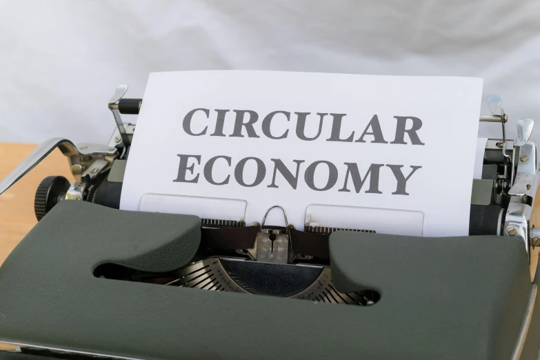 a pograph of an old fashioned typewriter with the words circular economy