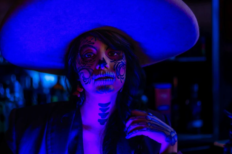 woman with face paint dressed up as skeleton