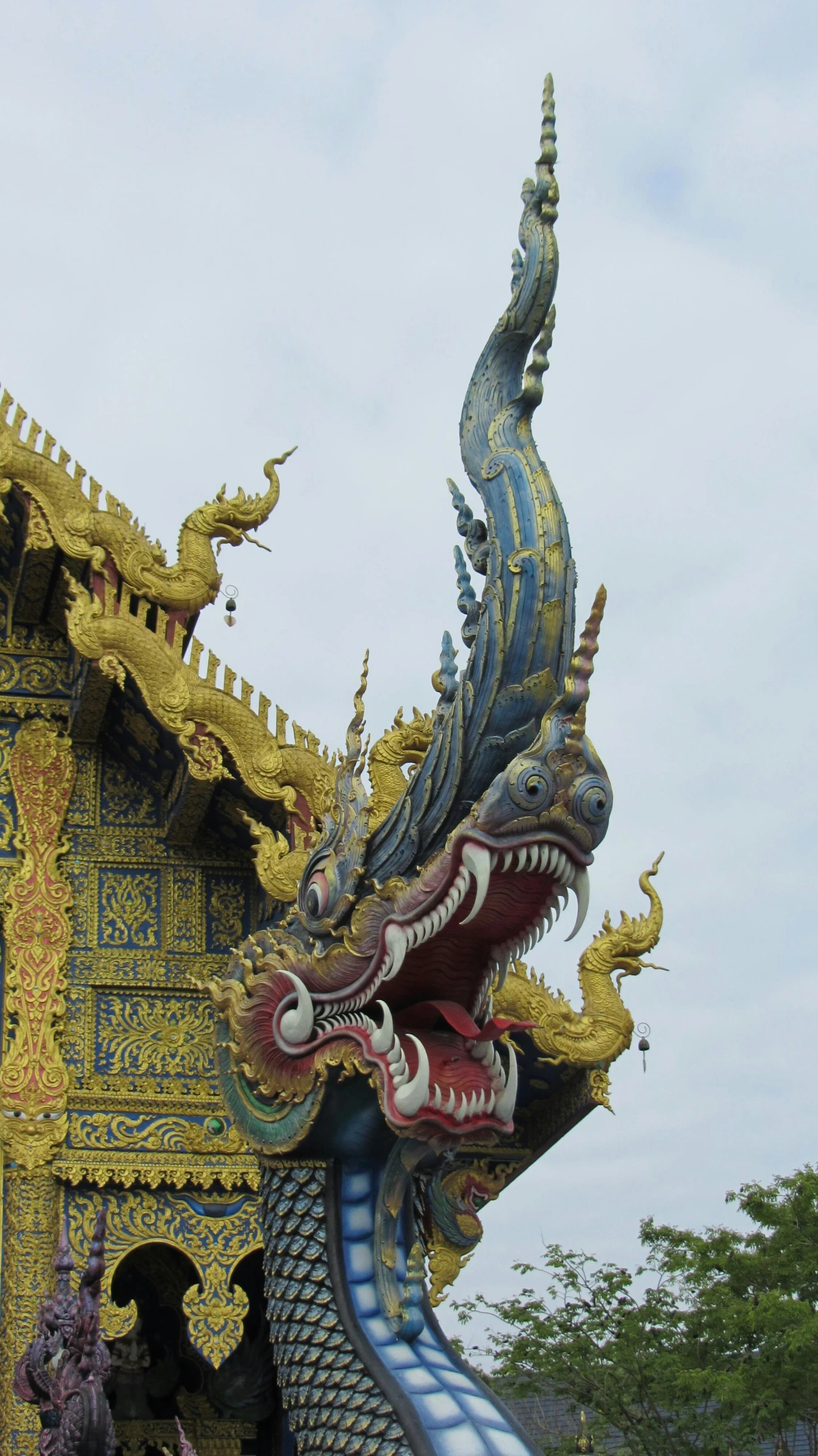 a large dragon shaped building with many different designs