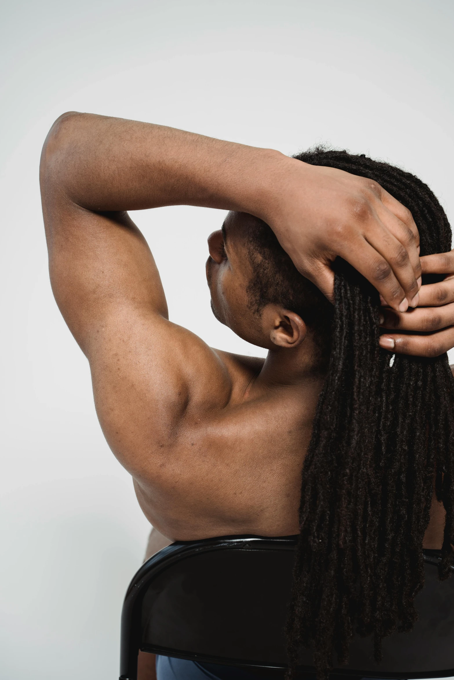 a close up of a man getting his hair id