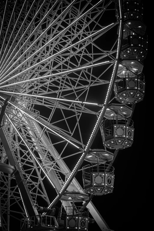 a very large ferris wheel on the street