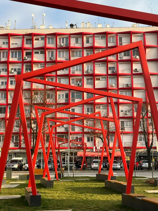 an artistic sculpture in front of the building