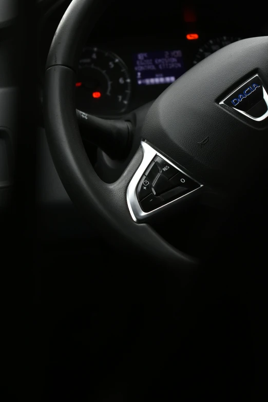 the dashboard of a car with an electronic dash light on