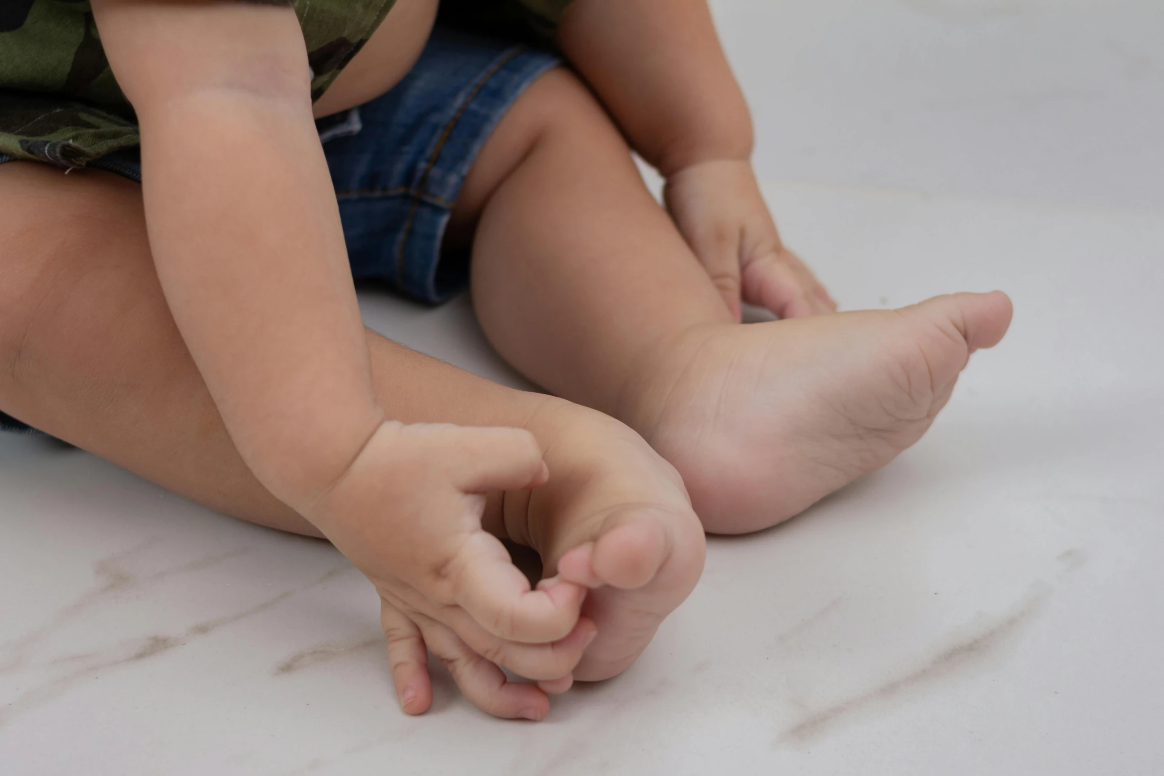 closeup on the feet of a small infant boy