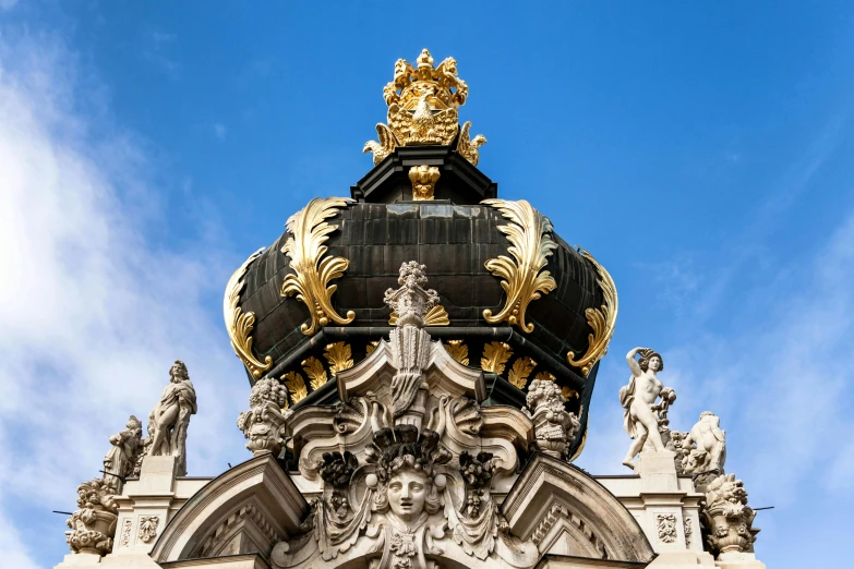 a view of a statue on top of a building