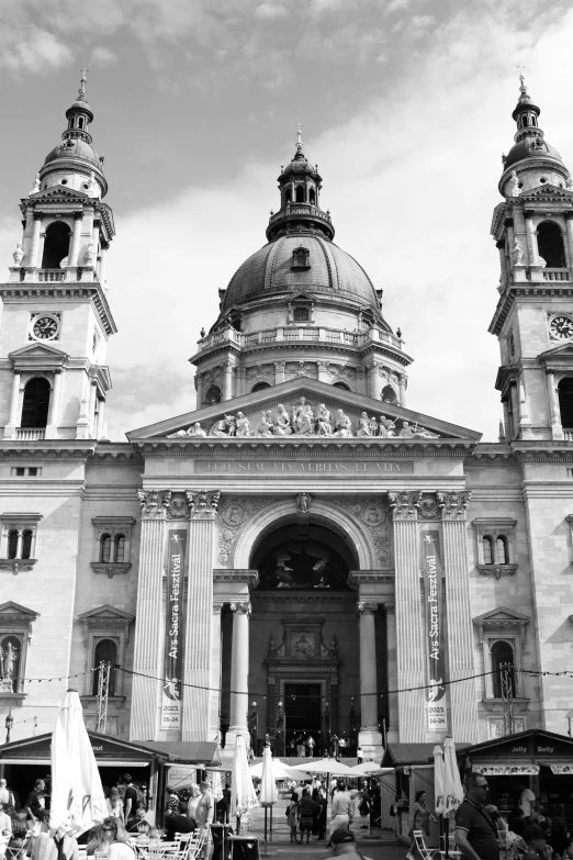 a large building with three tall towers on top