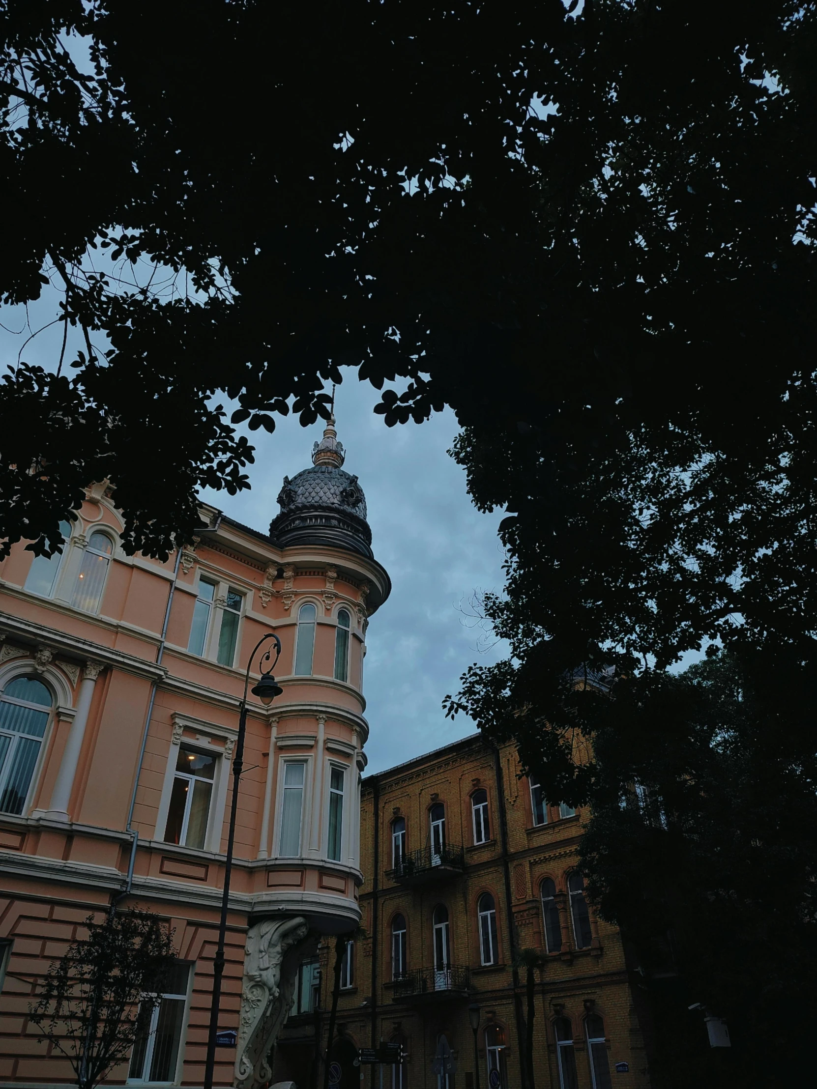 this is an ornate building in the twilight