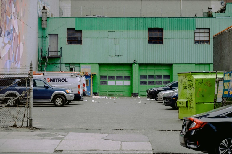 there are two trucks that are parked on the street