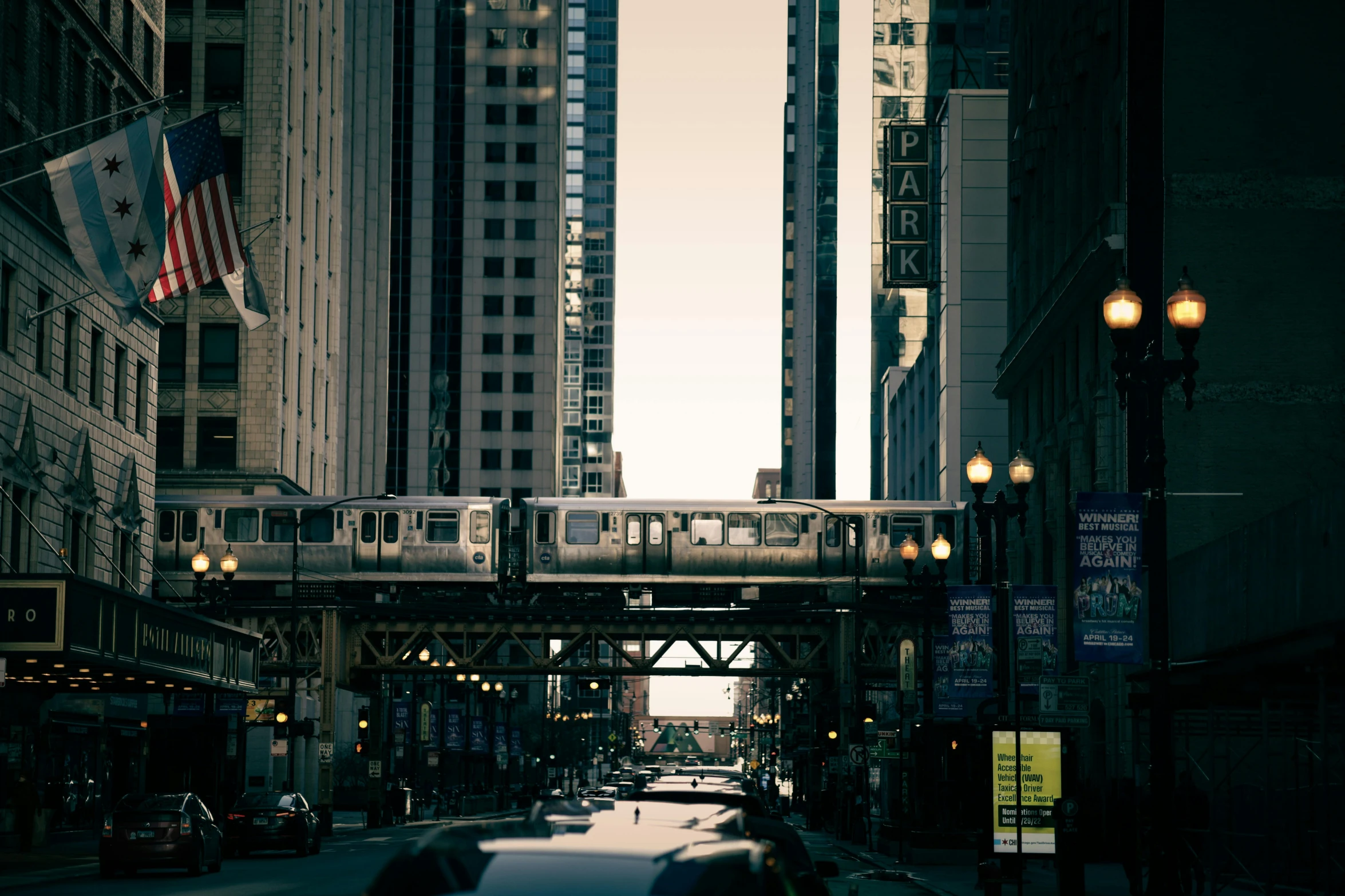 a train traveling down tracks on a city street