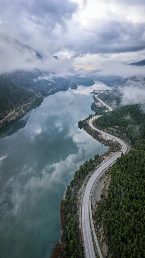 a long road going through the middle of some water