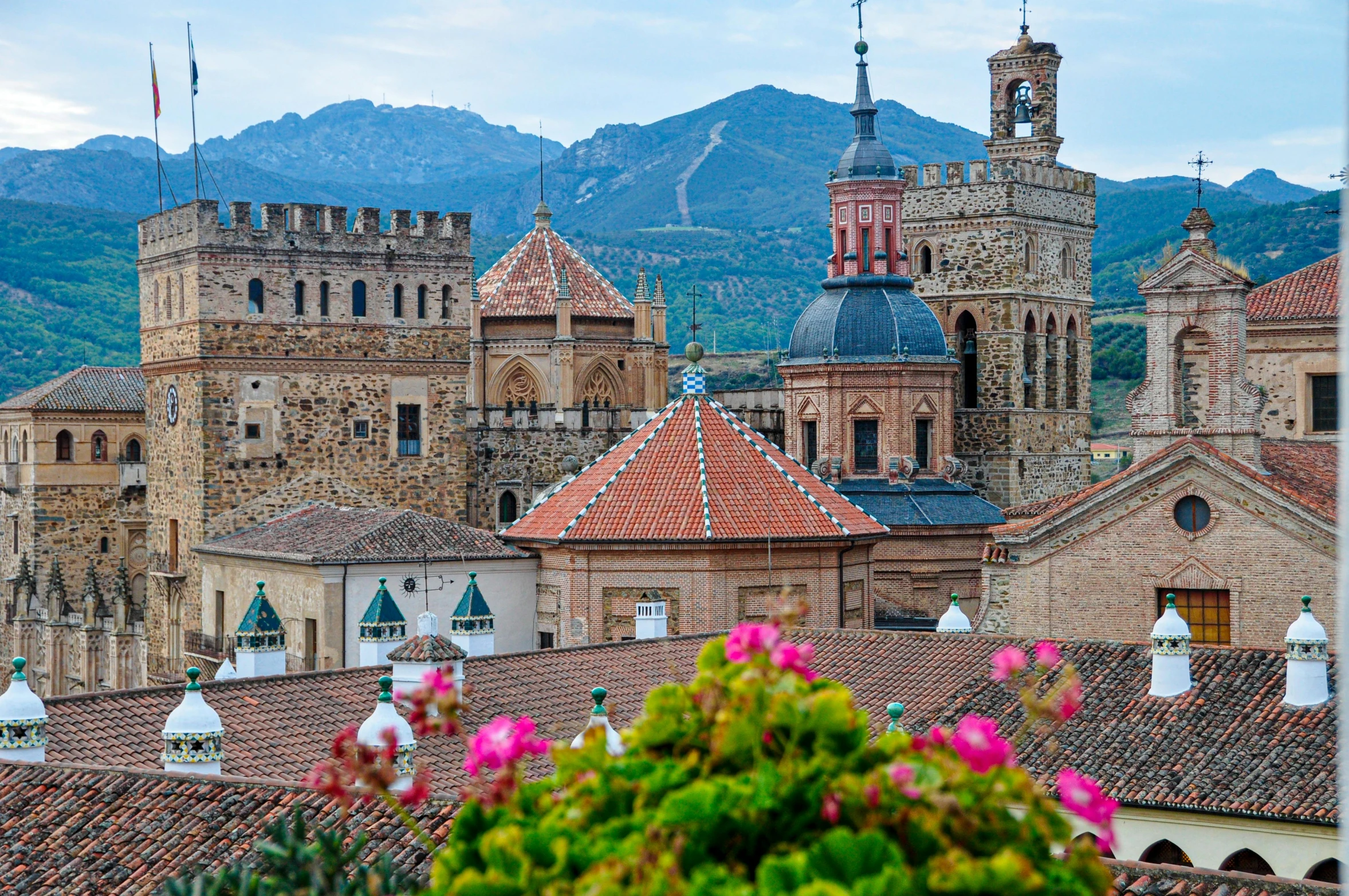 rooftops with buildings in a city with many spires