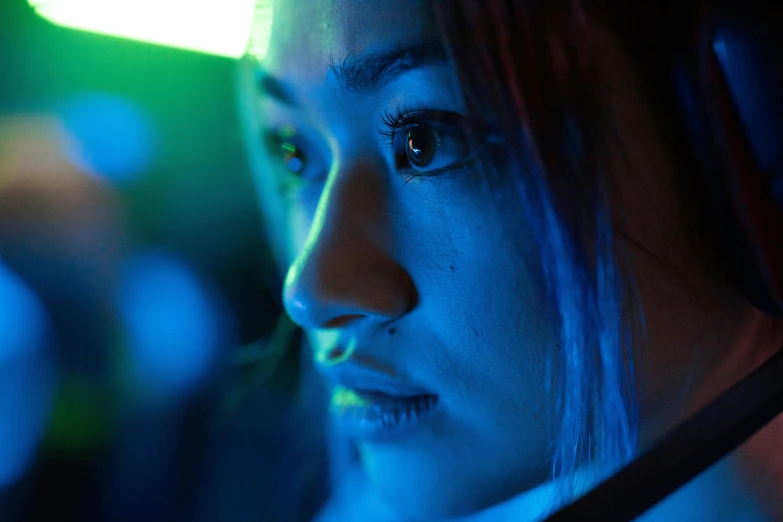 a close up po of a woman looking off in the distance