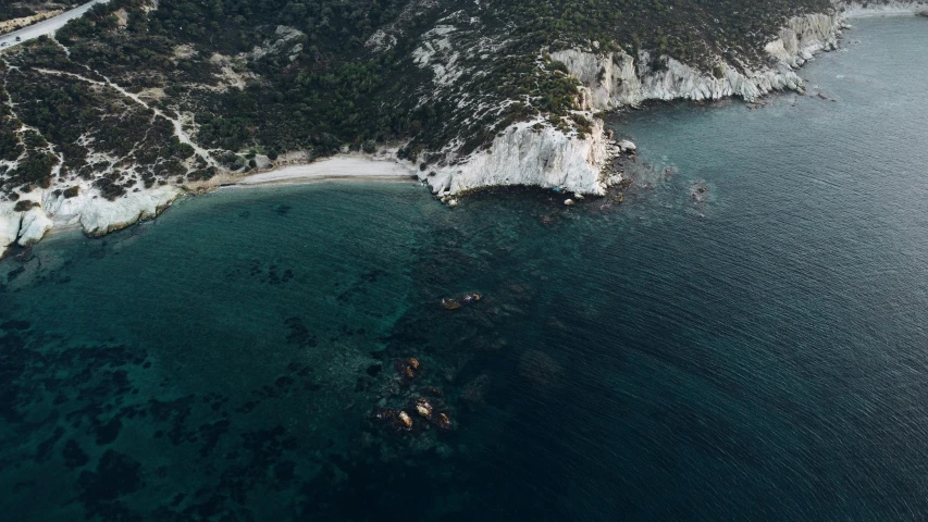 a landscape s with water and land, looking at the blue water of a bay