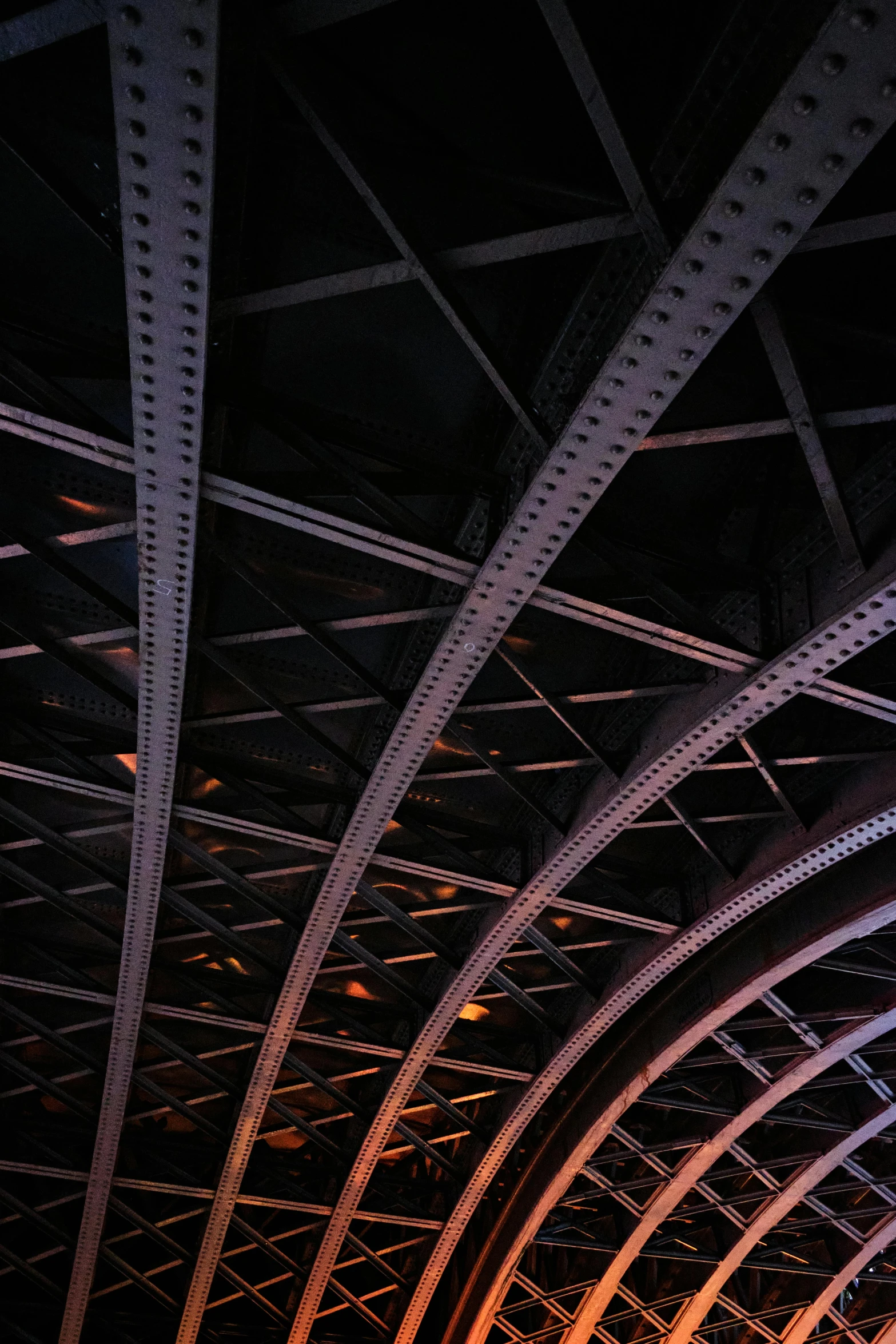 a very tall bridge with metal supports on it