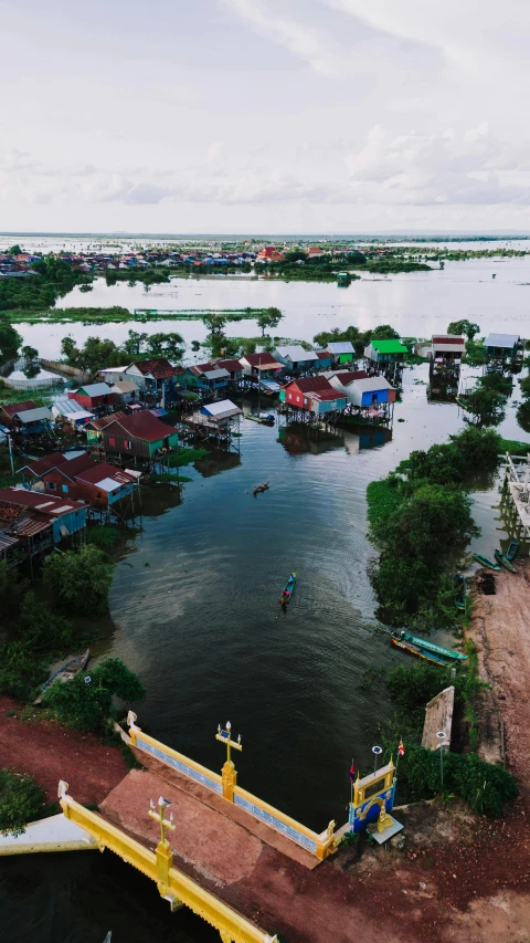 a small town with a lake and bridge