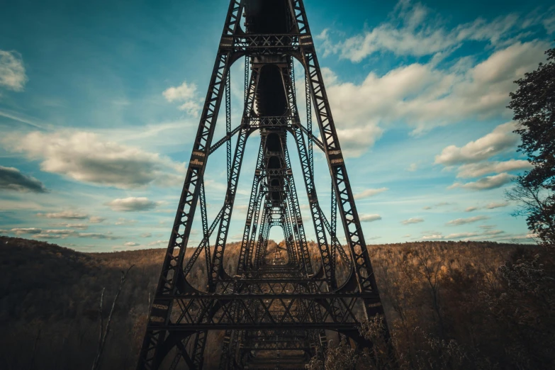 a black, ornate metal object sitting on a hill