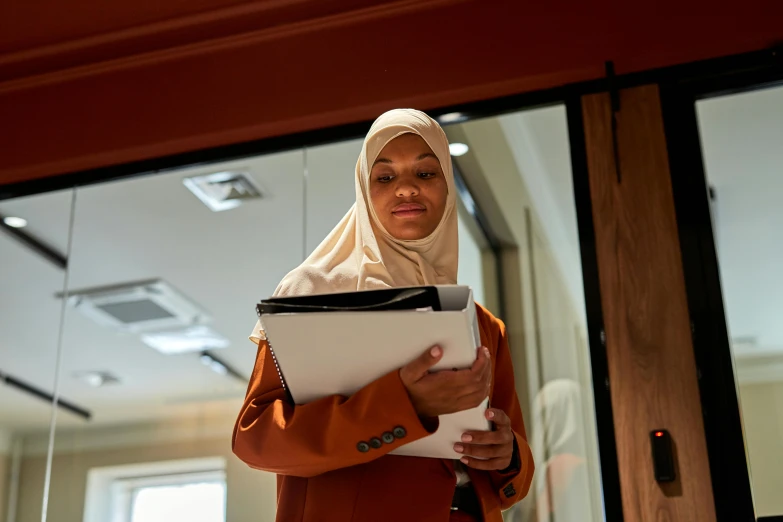 an african american woman looking at the camera