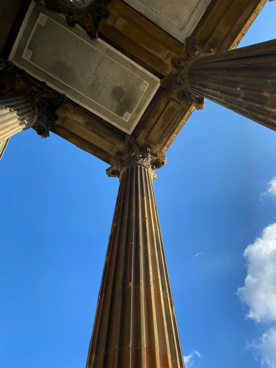 the view up into the sky of the columns