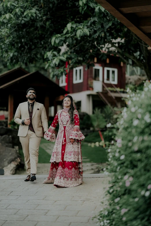 a man and woman dressed in vintage clothing