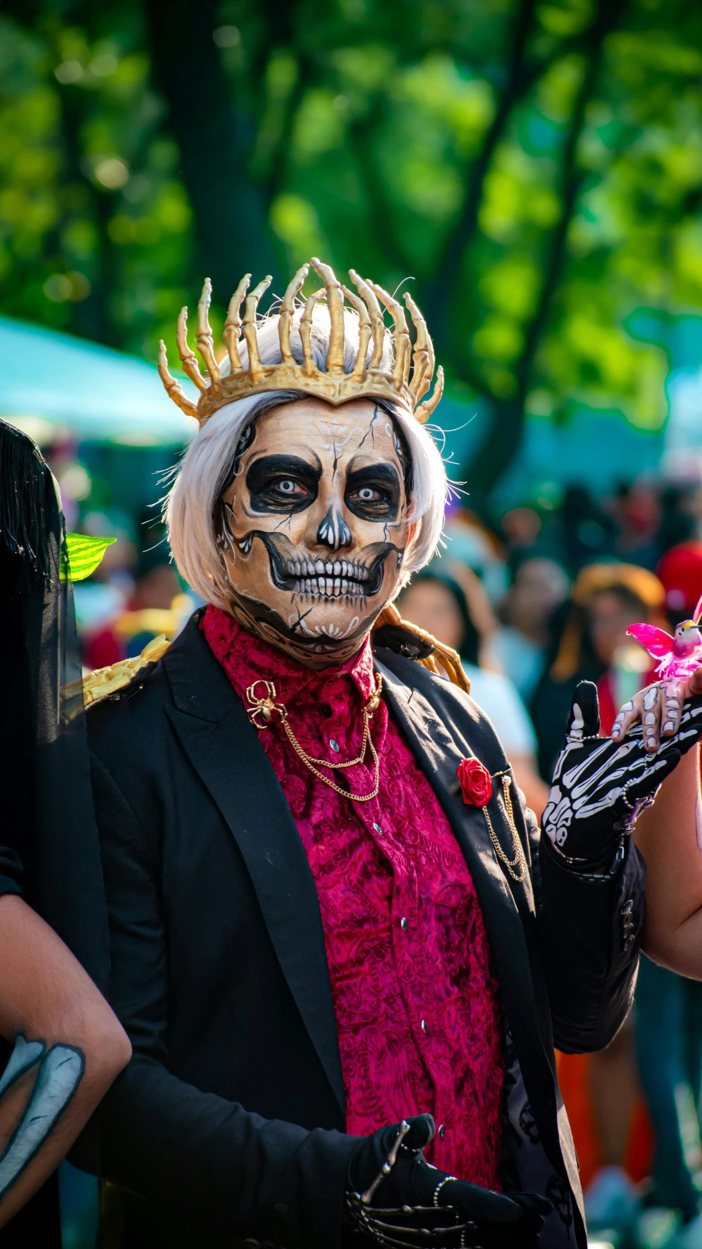 a person in a skeleton face paint outfit