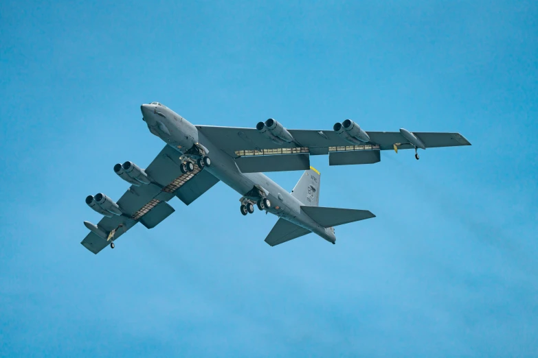 there are two planes flying through the blue sky