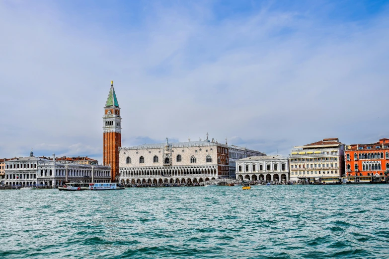 the water has a clock tower in it