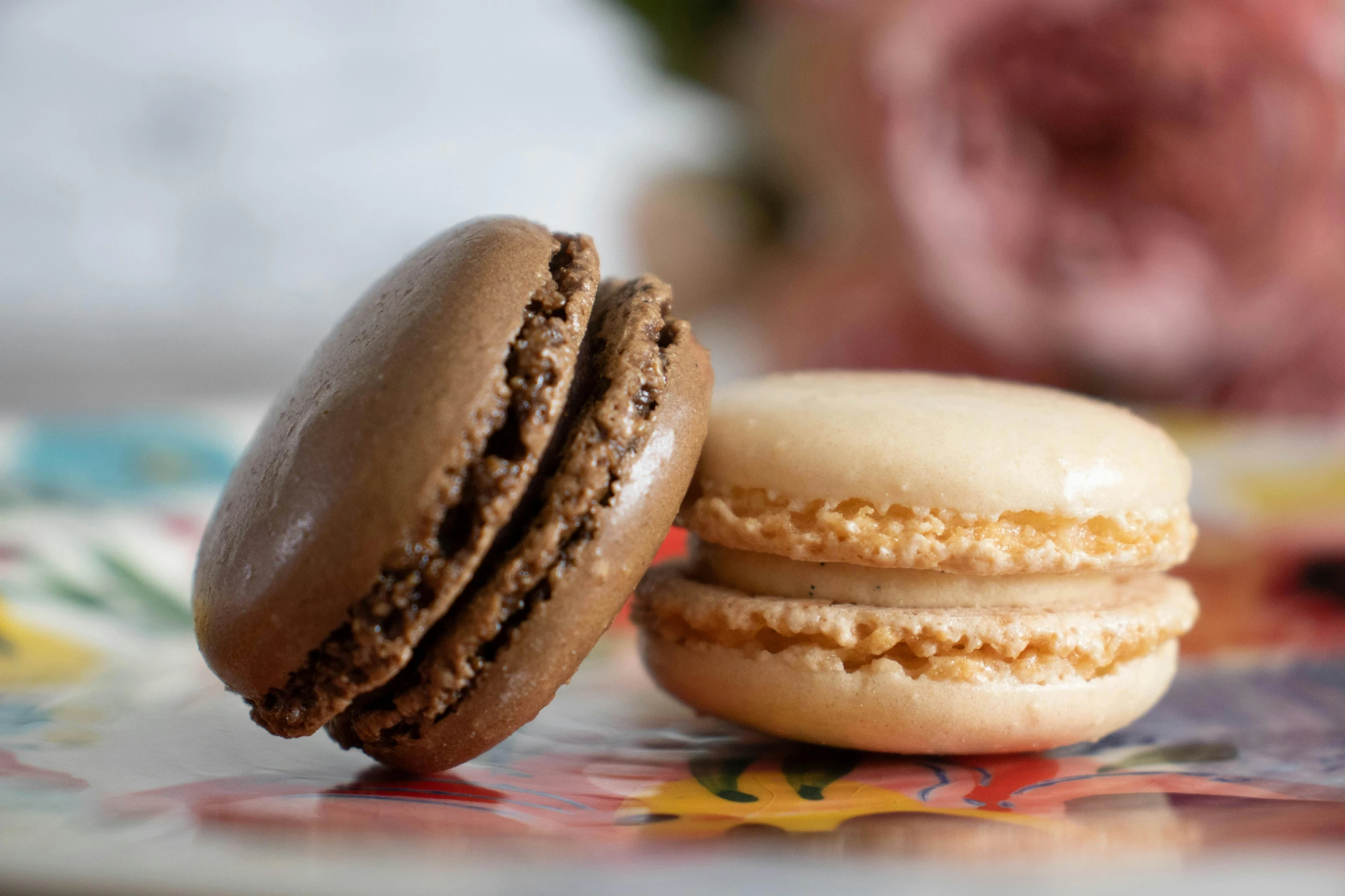 two cookies sitting next to each other on a table