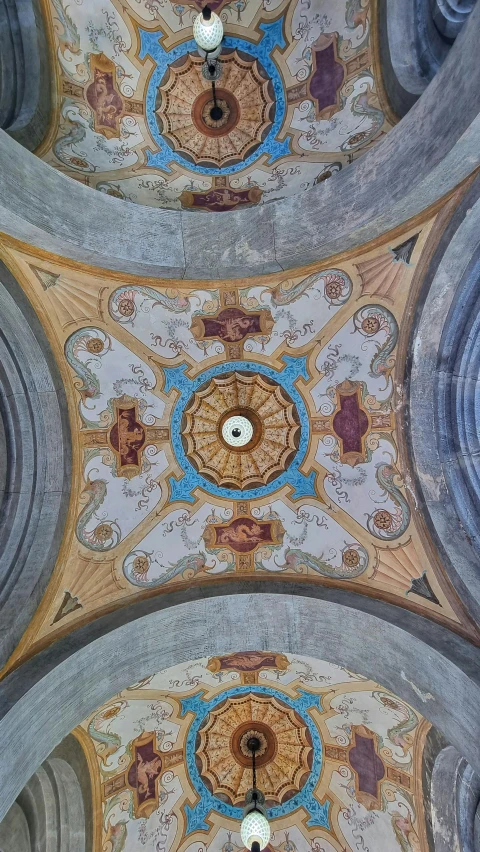 ceiling view of the intricate tile work in a church