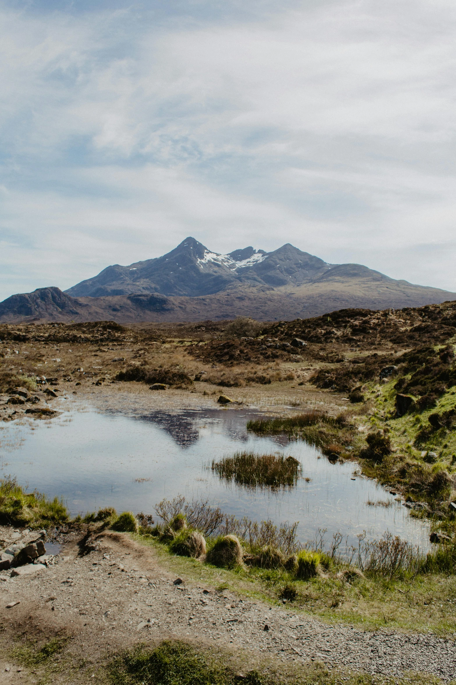 a view of mountains near a body of water