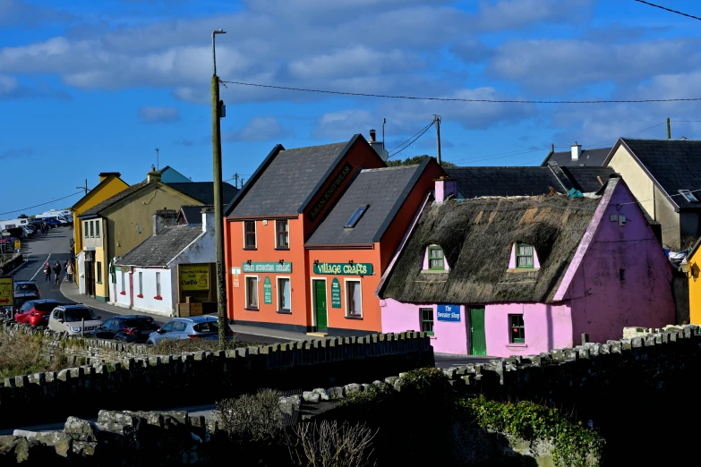 colorful, small houses in a row along a street