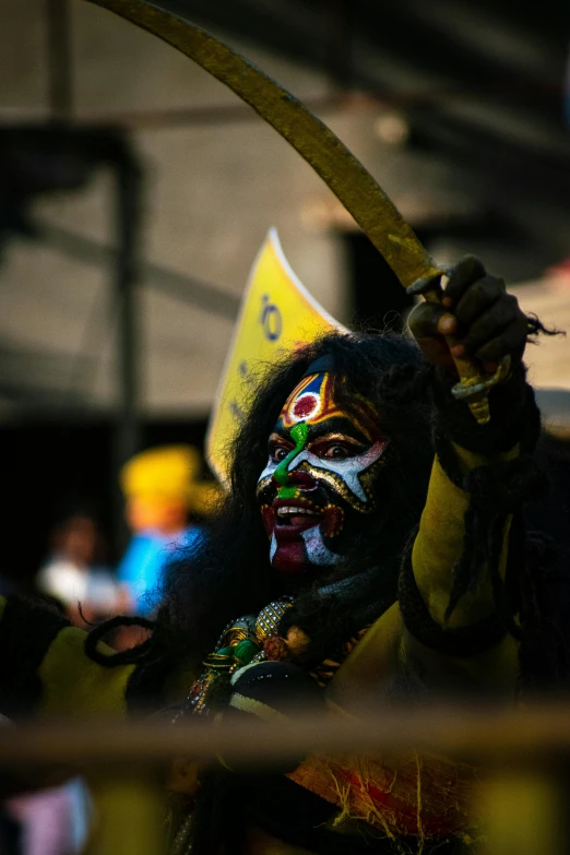 a masked man is standing near the camera