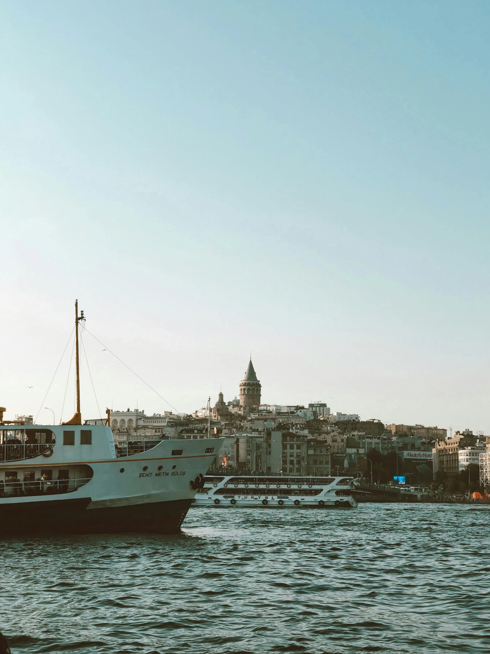 an image of boat floating on water in the city